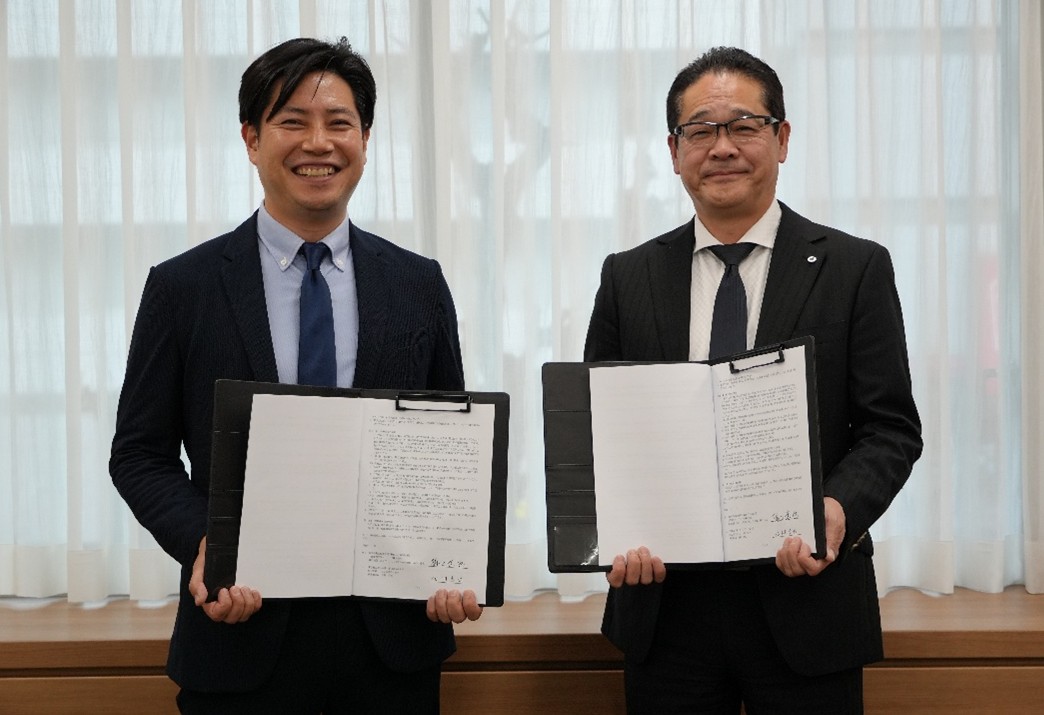 業務提携時の写真